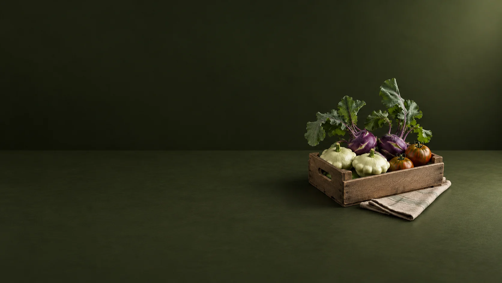 A wooden crate holding purple kohlrabi, pale pattypan squash and striped tomatoes beside folded linen. - Specialty & Organic Farming Meta ads research by Madgicx Labs