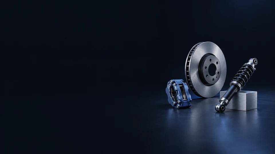 A ventilated brake rotor, blue caliper and coilover damper beside a machined aluminum support. - Automotive Parts & Accessories Meta ads research index