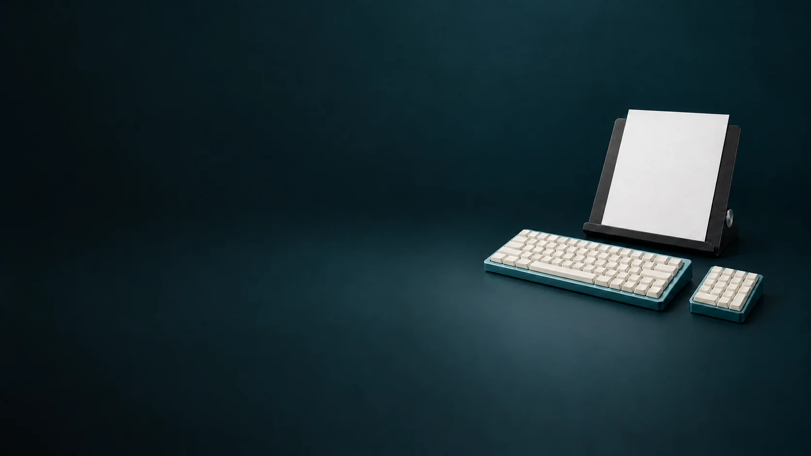 A blank-key teal keyboard and separate keypad in front of a charcoal copyholder with an unmarked source sheet. - Data Entry & Processing Services Meta ads research by Madgicx Labs