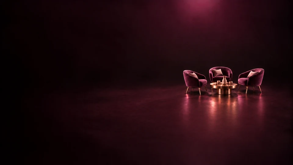 Three empty curved lounge chairs around a small round table. - Content Creators & Influencers Meta ads research index