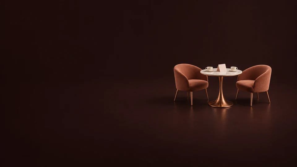Two terracotta chairs around a copper cafe table with cups and a blank invitation. - Dating & Relationship Services Meta ads research index