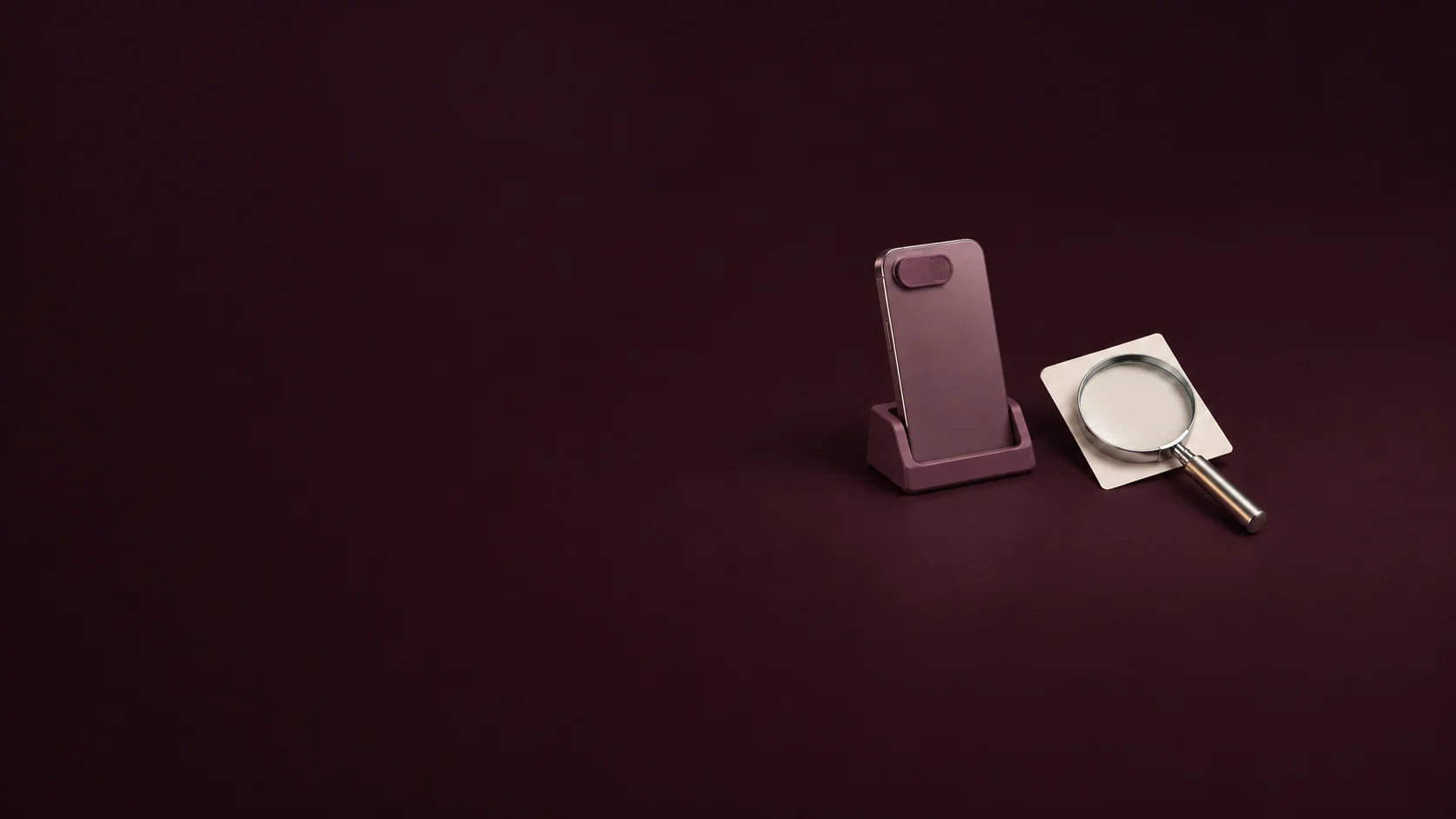 An unbranded phone with a camera cover beside a magnifying glass and blank card. - Dating Safety & Verification Services Meta ads research by Madgicx Labs