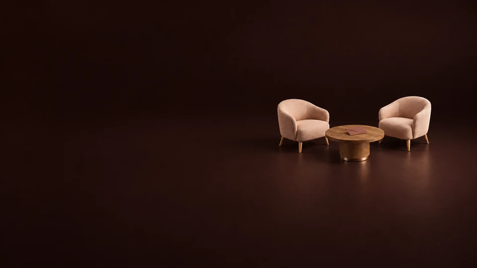 Two peach lounge chairs beside an oak table with a closed russet envelope. - Dating & Relationship Services Meta ads research index
