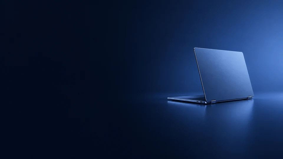 Blue aluminum laptop shown from the rear with its lid open. - Electronics & Tech Devices Meta ads research index