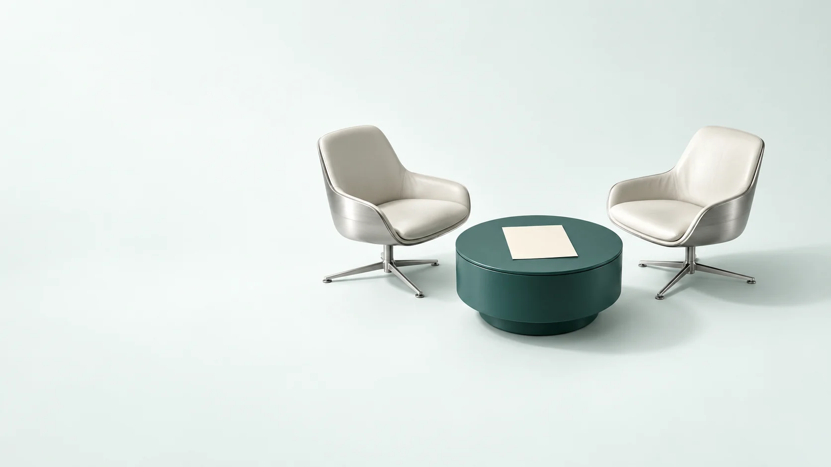 Two miniature consultation chairs around a low teal table with a blank planning sheet. - Wealth Management Advisory Meta ads research by Madgicx Labs