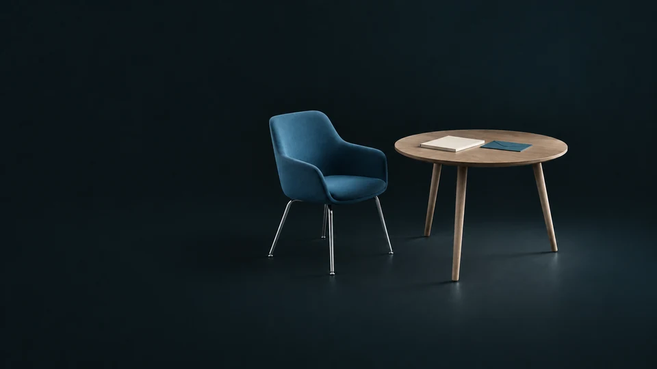 An empty blue chair beside a wooden interview table with a blank folio and envelope. - Recruitment & HR Services Meta ads research index