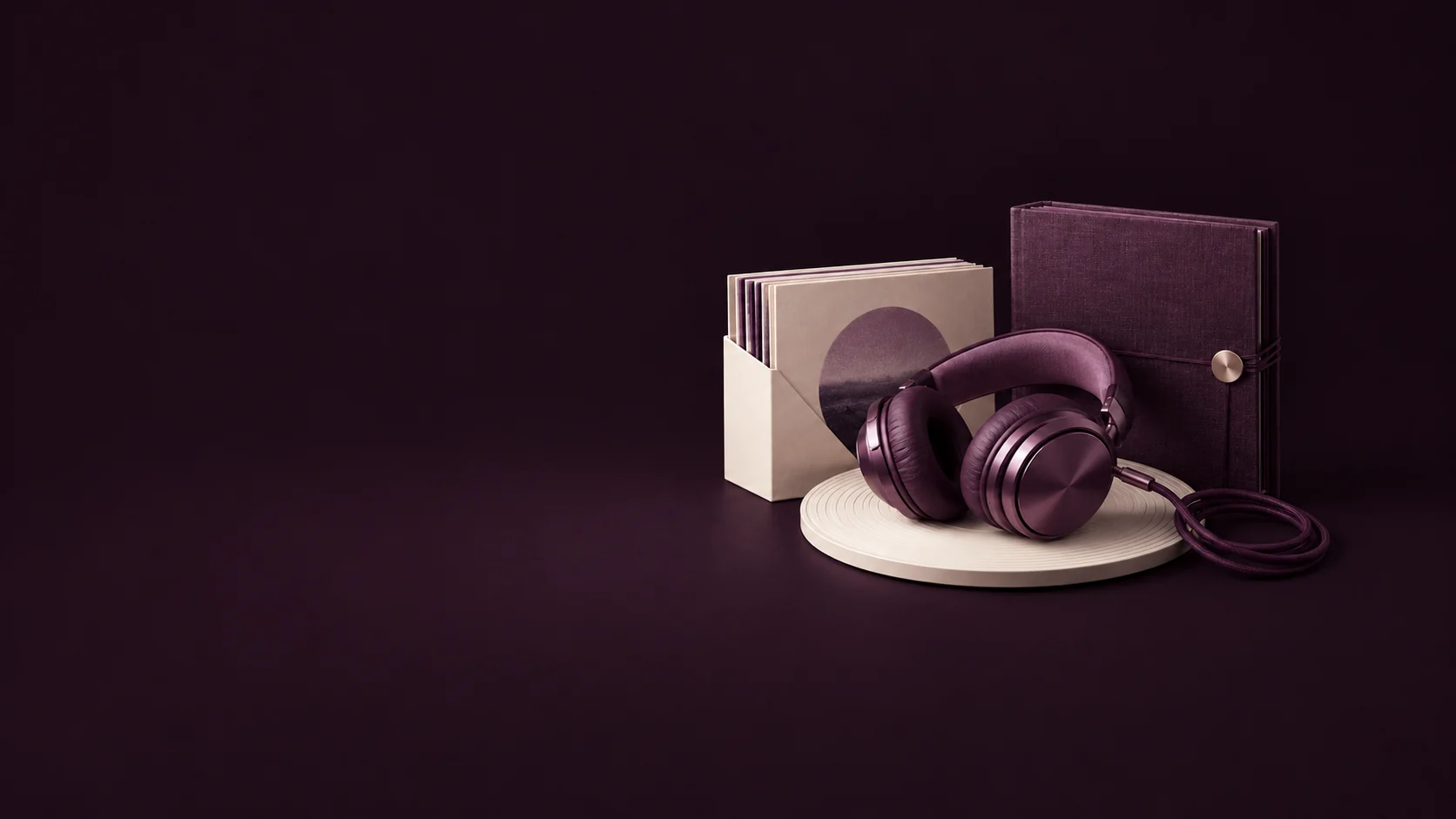 Plum over-ear headphones and a coiled cable on a grooved ivory disc beside audio sleeves and a folio. - Stock Music & Audio Platforms Meta ads research by Madgicx Labs