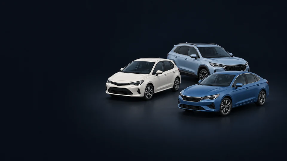 An ivory hatchback, pale-blue SUV and blue sedan grouped on a dark studio floor. - Vehicle Sales & Transportation Products Meta ads research index